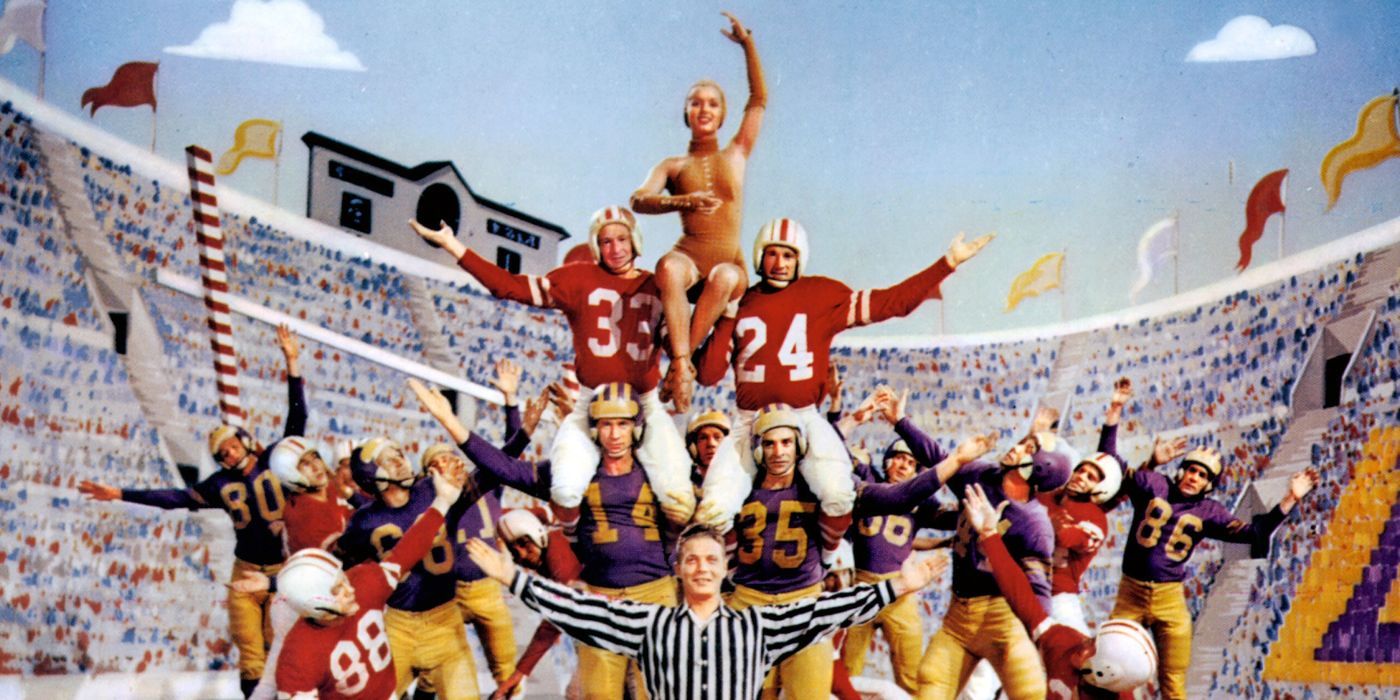 Debbie Reynolds being raised by a football team in formation in a still from Easy in Love