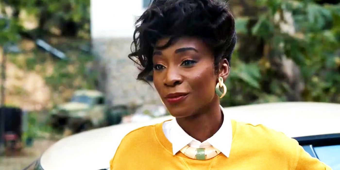 Donna Chambers (Angelica Ross) in a yellow sweater in American Horror Story 1984