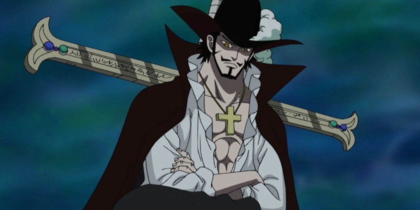 Screenshot from One Piece anime shows Mihawk standing with his arms crossed with a cloudy background. His giant sword on his back and his cross necklace around his neck.
