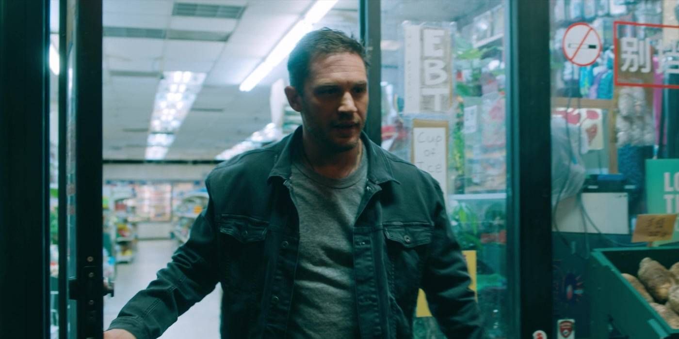 Eddie Brock leaving conveniece store in Venom Let There Be Carnage pic