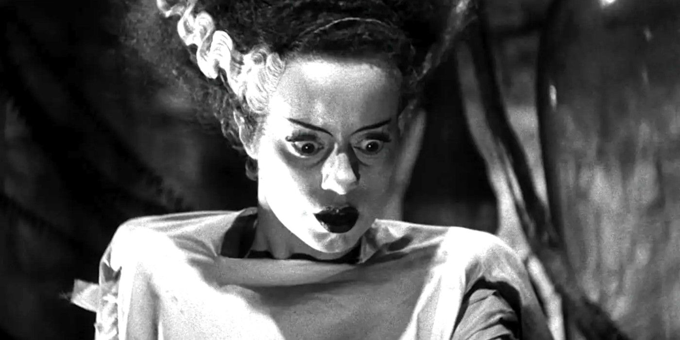 Elsa Lanchester gazing downward wide-eyed in Bride of Frankenstein