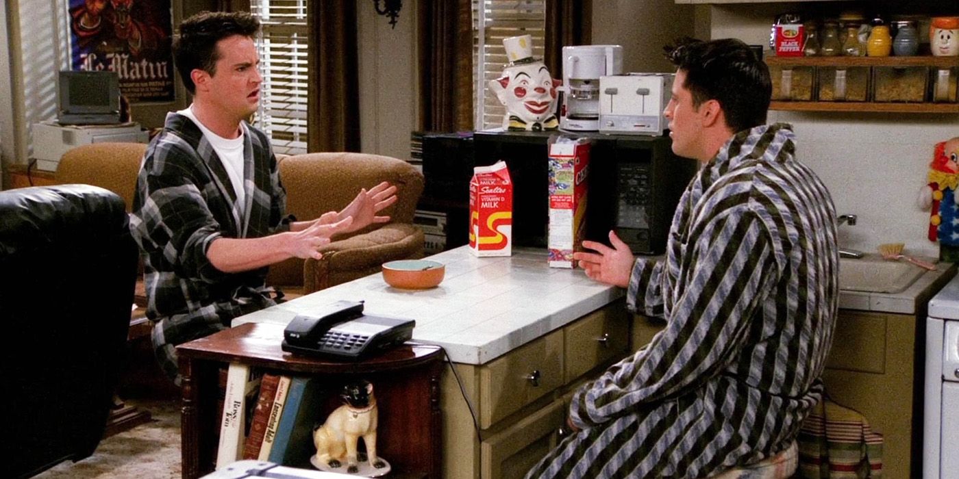 Friends Chandler and Joey in their apartment