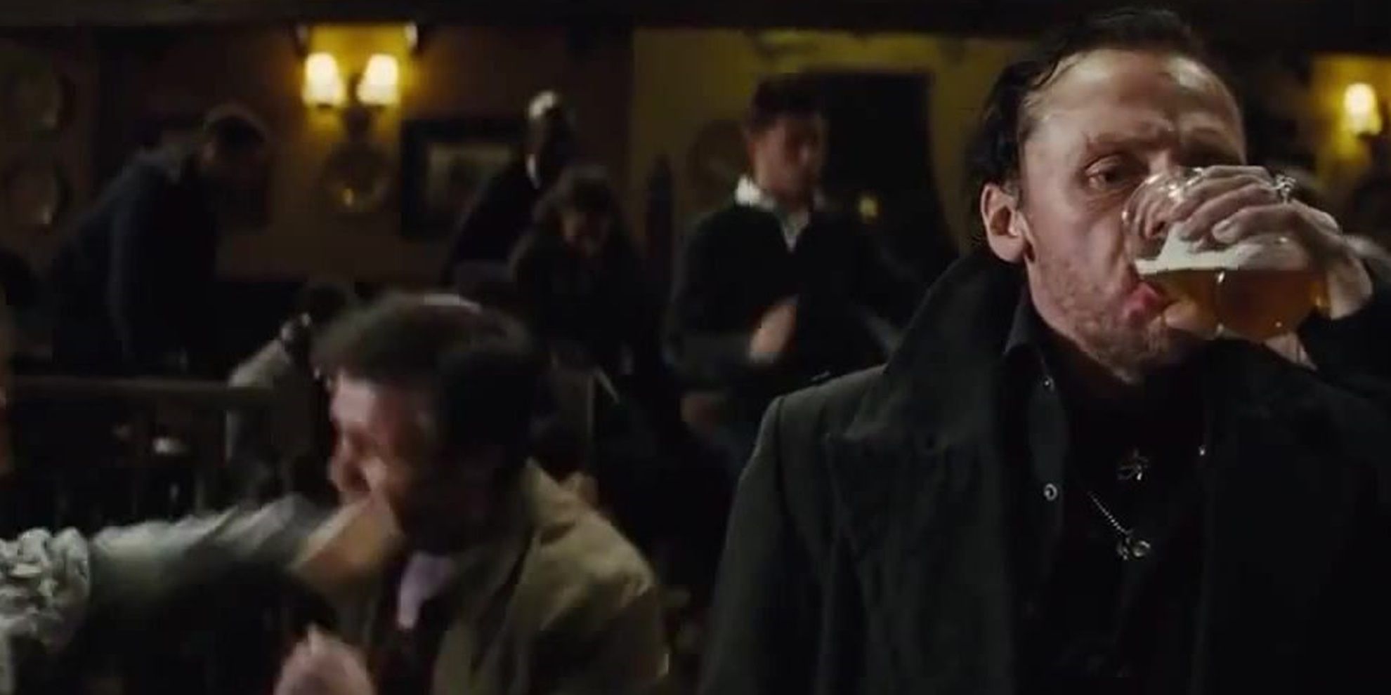 Gary drinks during a bar fight in The World&rsquo;s End