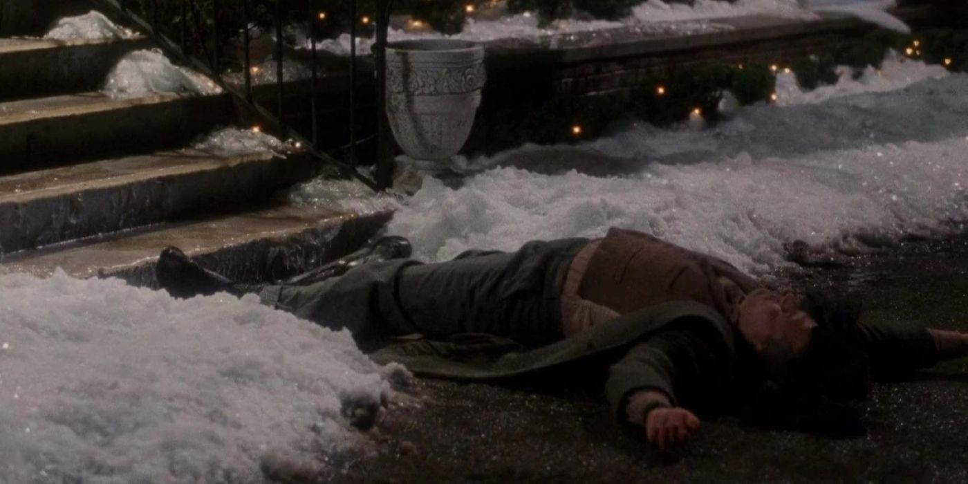 Harry lying on the ground after slipping on the icy stairs in Home Alone.