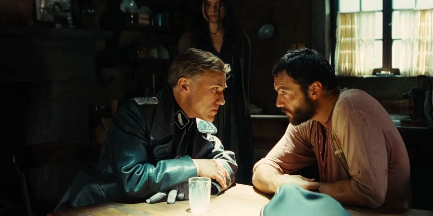 Hans Landa and LaPadite staring each other down at the table in Inglourious Basterds