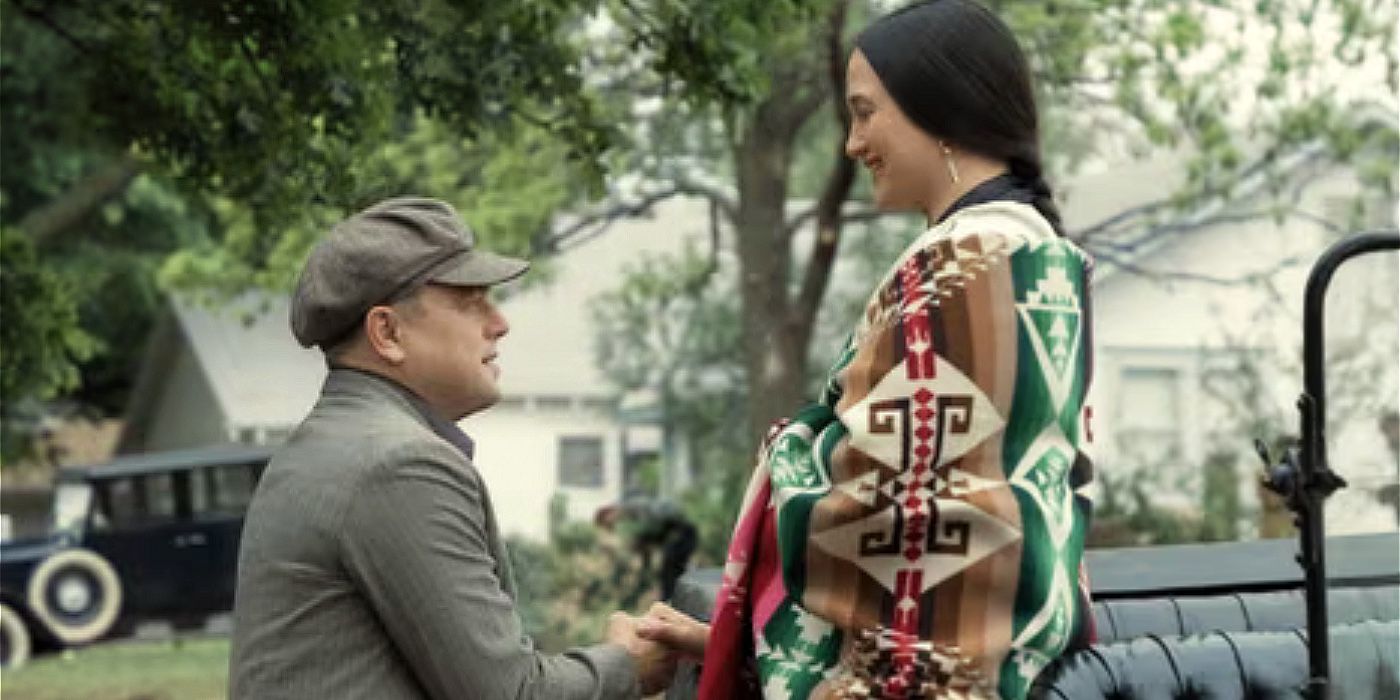 Ernest Burkhart on his knees before Mollie Burkhart in Killers of the Flower Moon.