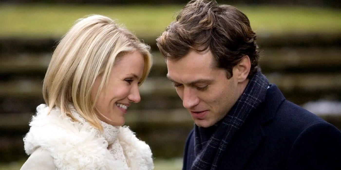 Amanda and Graham talking and smiling at each other in The Holiday