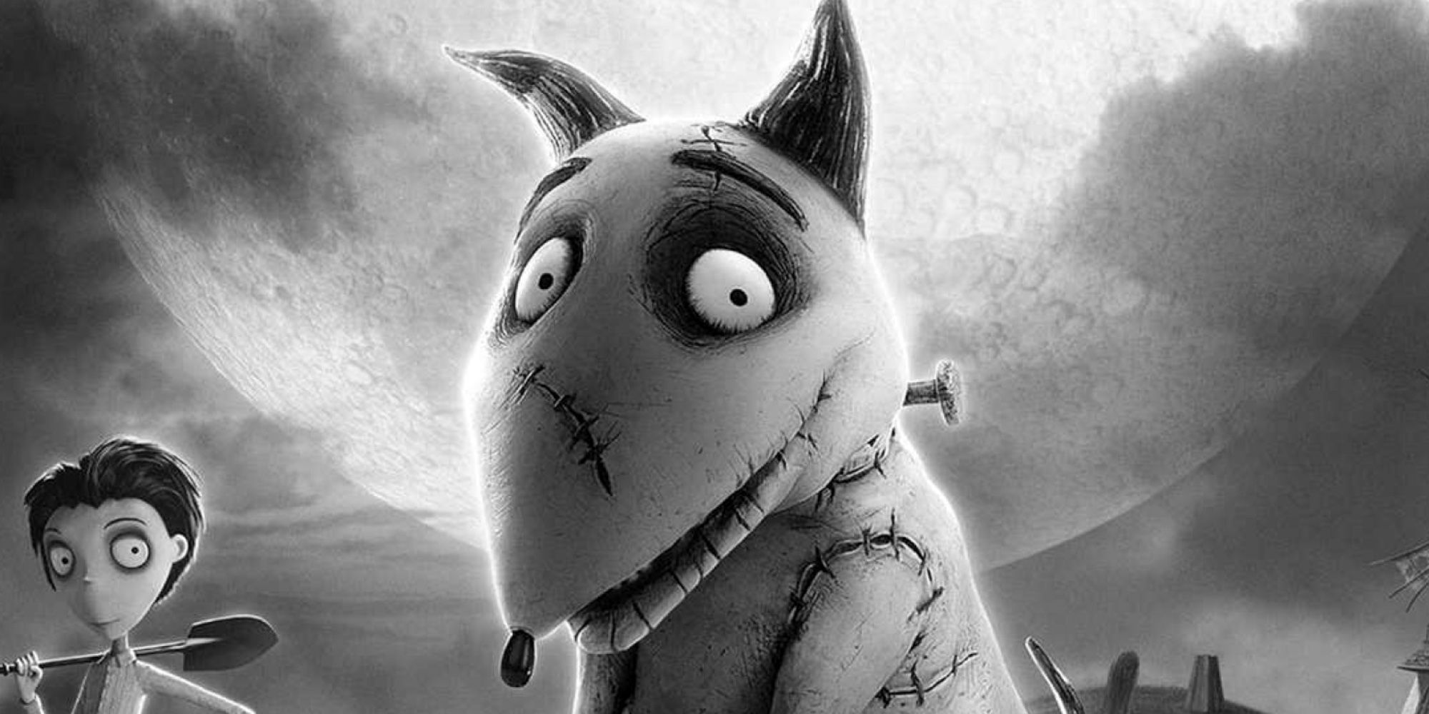 Sparky smiling, with Victor in the back with a shovel in the movie poster for Frankenweenie.