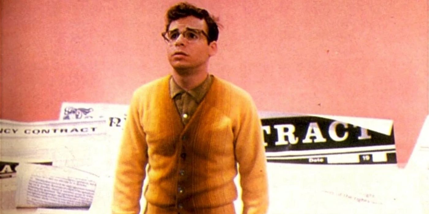 Seymour is surrounded by contracts in Little Shop of Horrors.