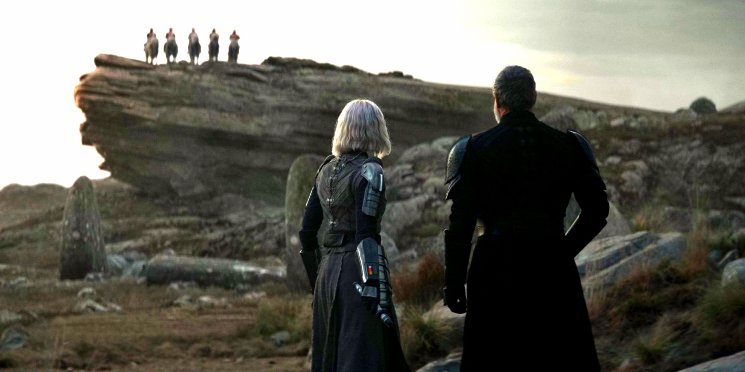 Baylan and Shin look out at the bandits in the distance in Ahsoka.
