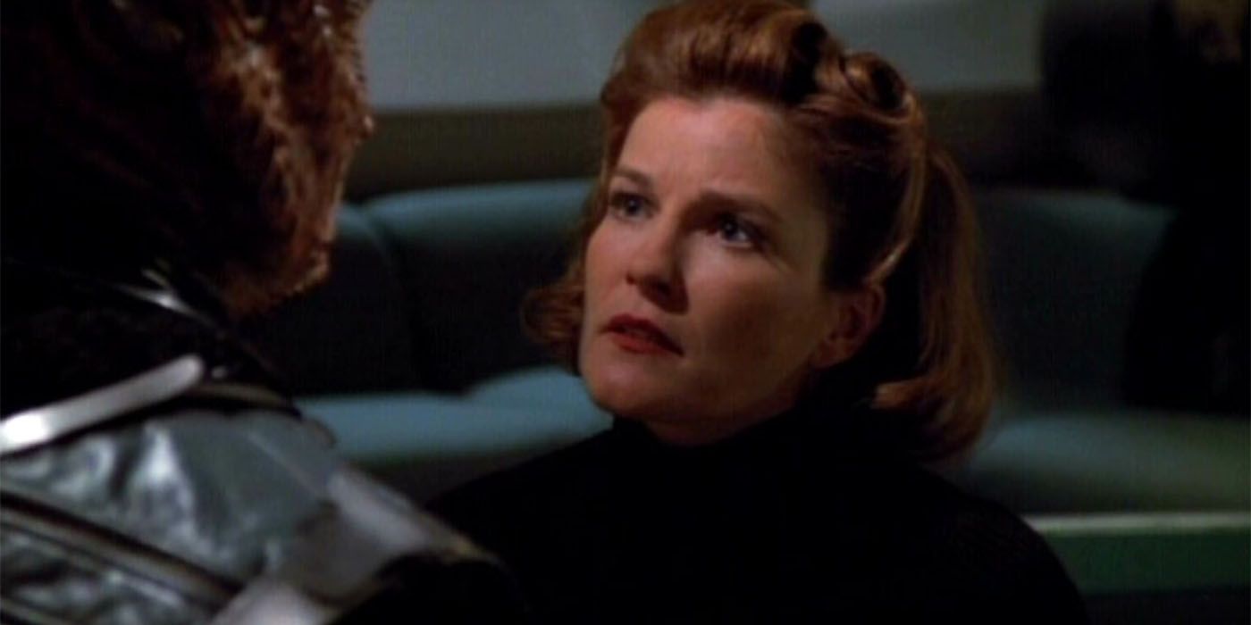 Janeway Confronts a Hirogen in Voyager The Killing Game