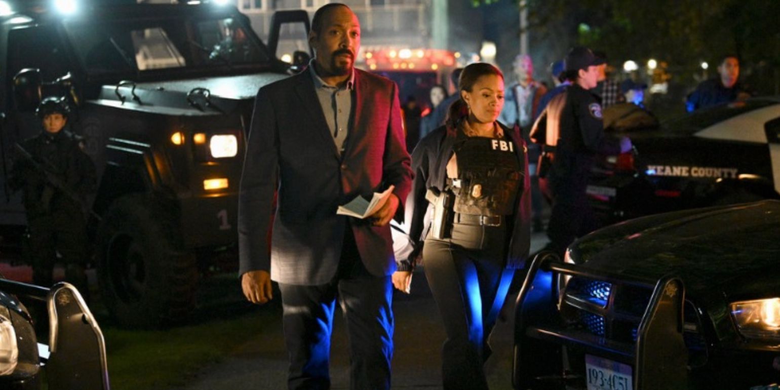 Jesse L Martin walking among law enforcement and police cars in The Irrational
