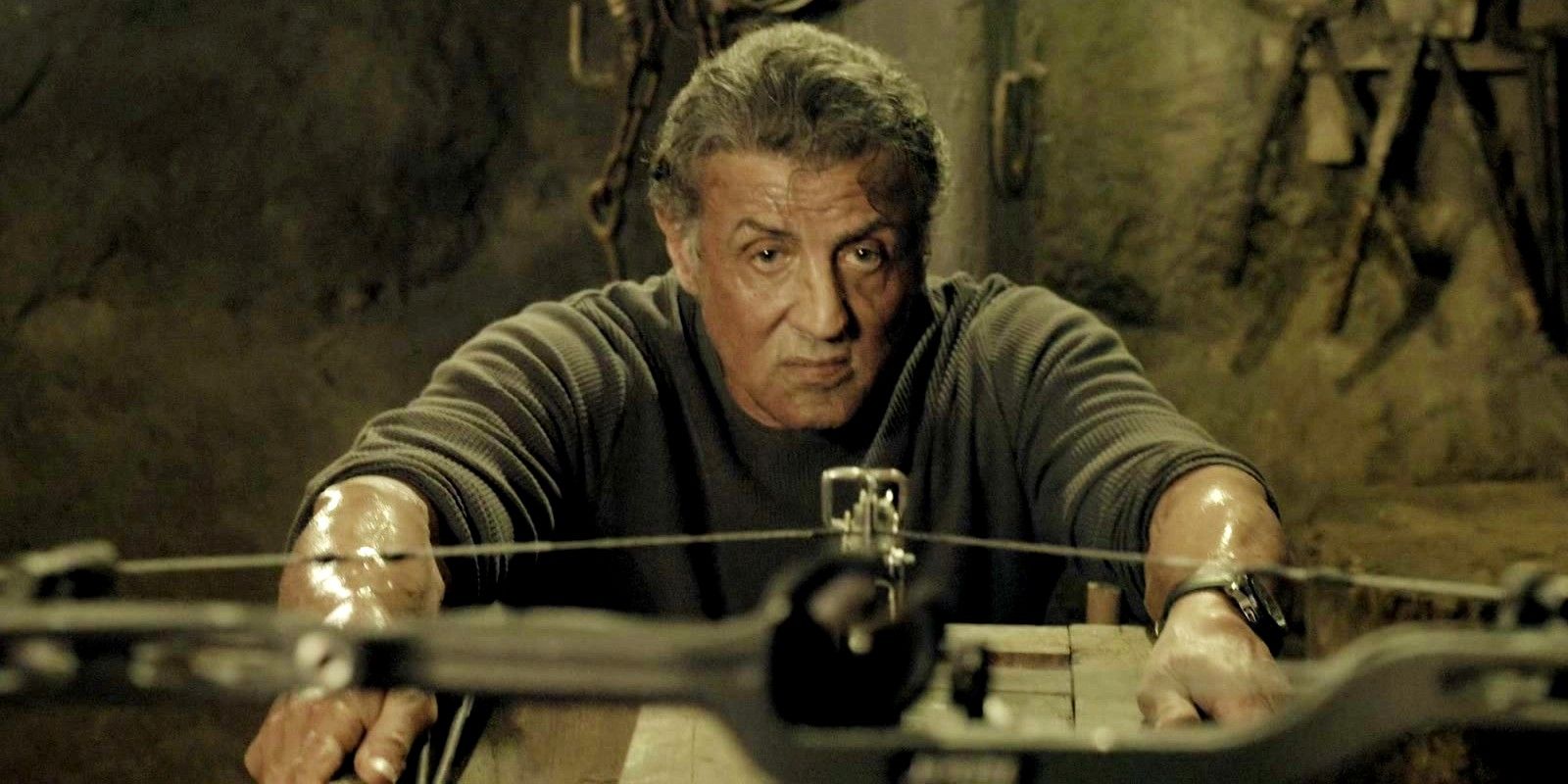 John Rambo preparing his crossbow in Last Blood