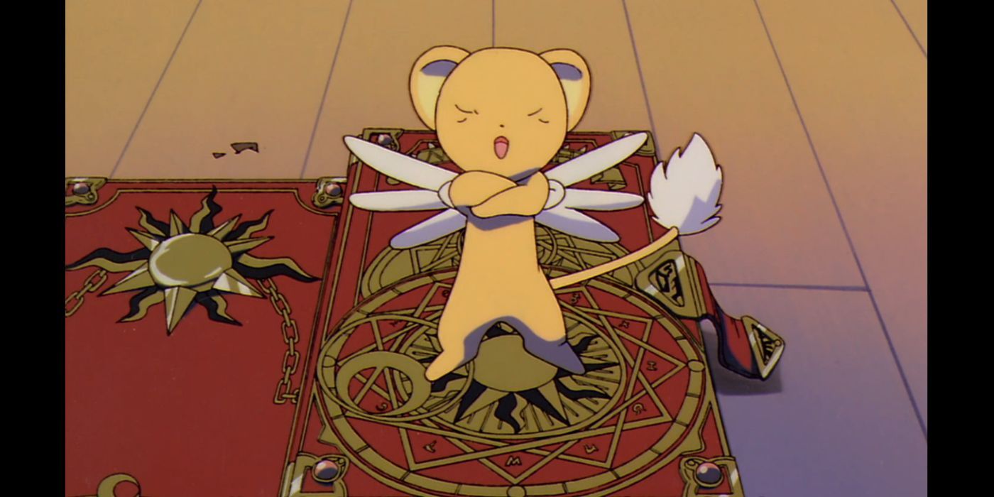 Keroberos-from-Cardcaptor-Sakura-standing-on-the-Clow-Book-with-his-arms-crossed