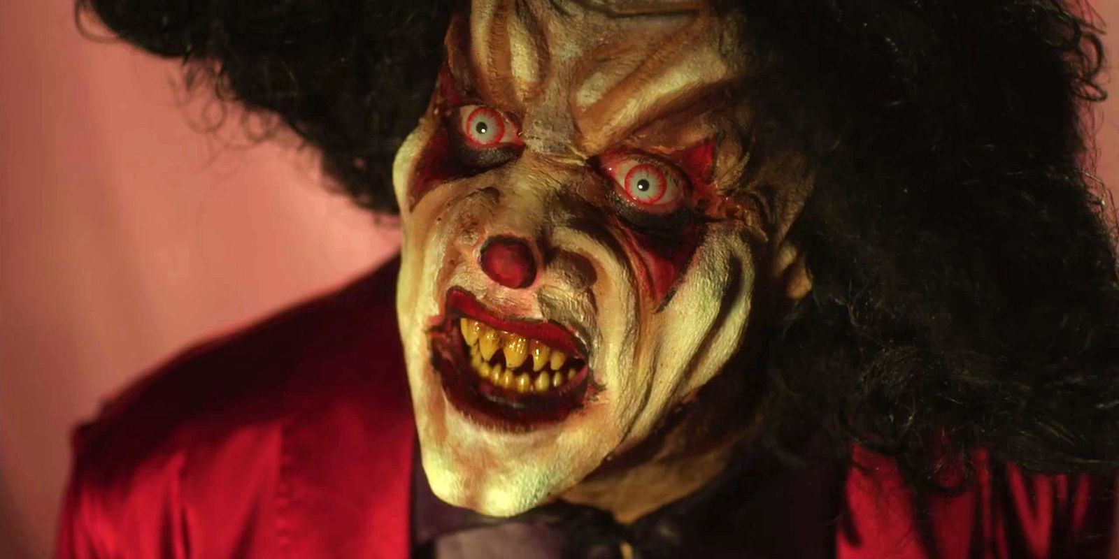 Killjoy cocks his head to the side and stares bug-eyed