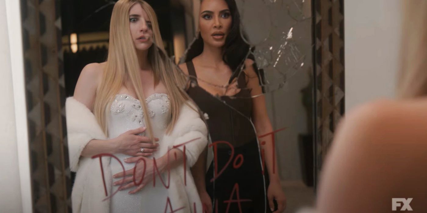 Kim Kardashian and Emma Roberts looking in a broken mirror in American Horror Story Delicate.