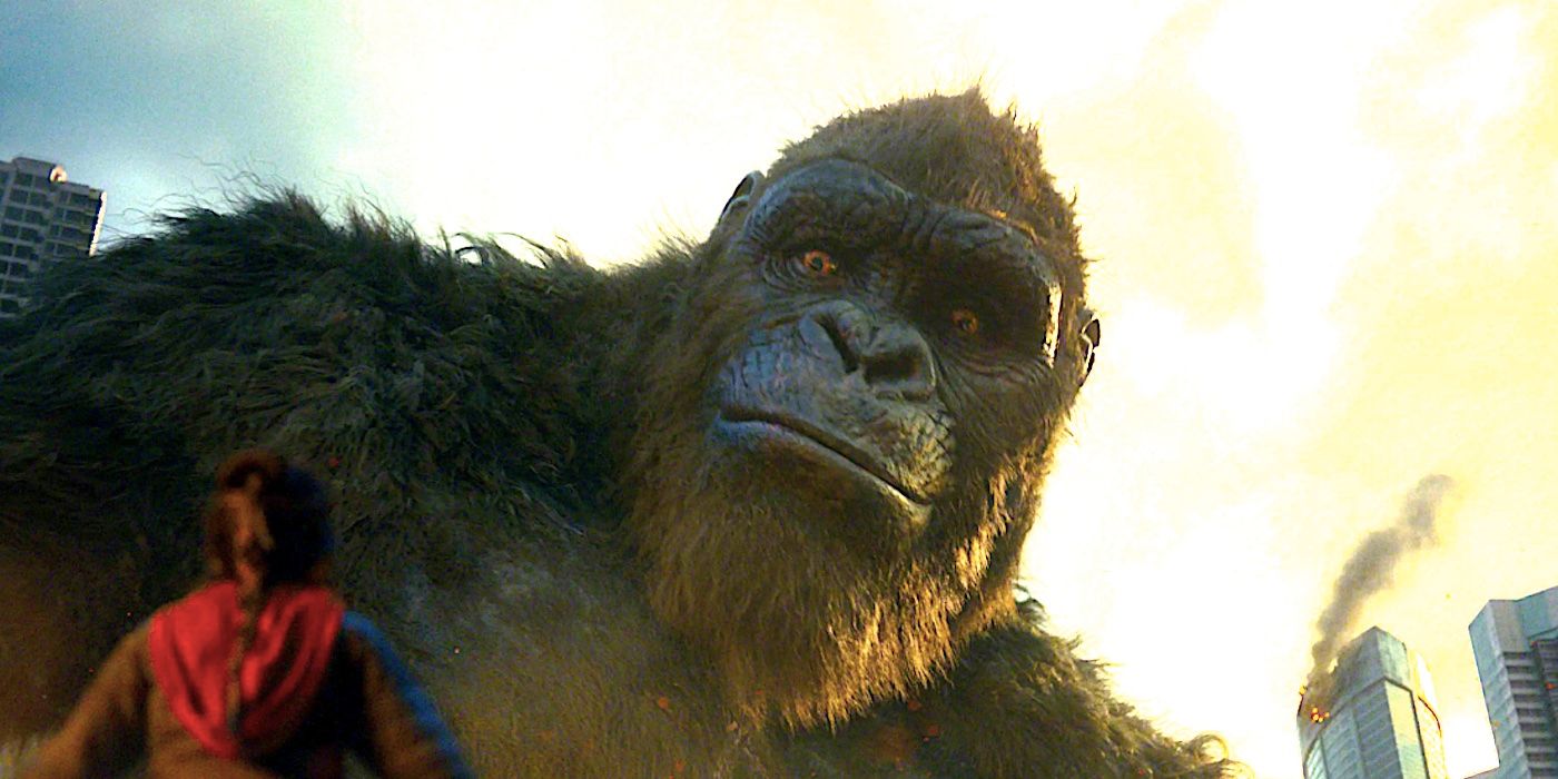 King Kong smiles doen at a young girl in Godzilla vs Kong 2021