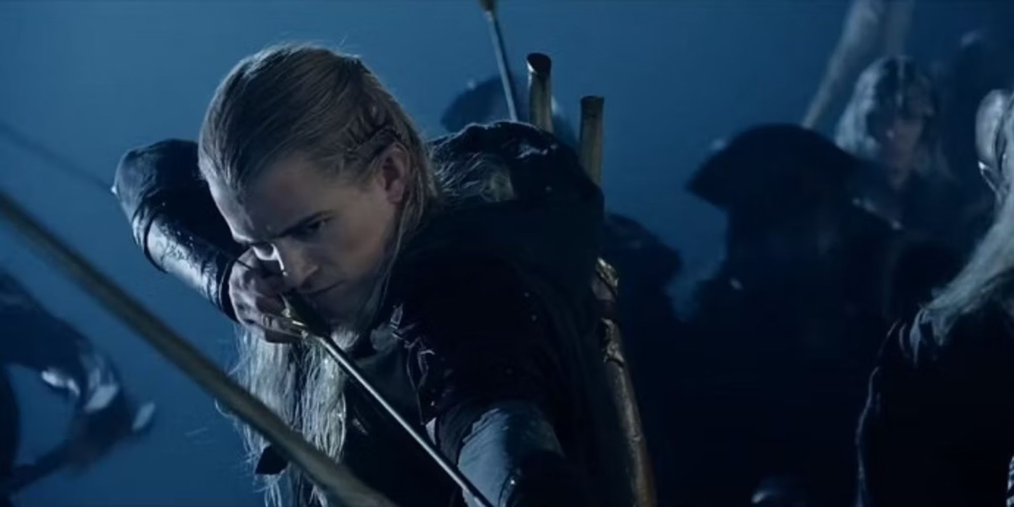 Legolas preparing his bow and arrow