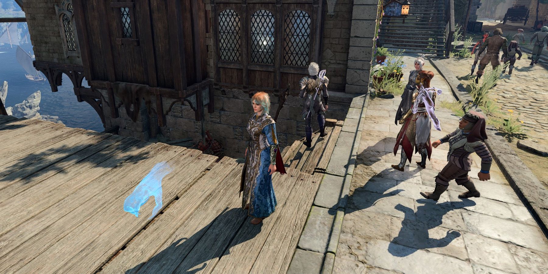 A floating blue Mage Hand cast next to a party in Baldur's Gate 3.