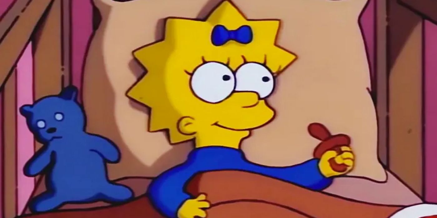 Maggie smiling and holding her pacifier in The Simpsons