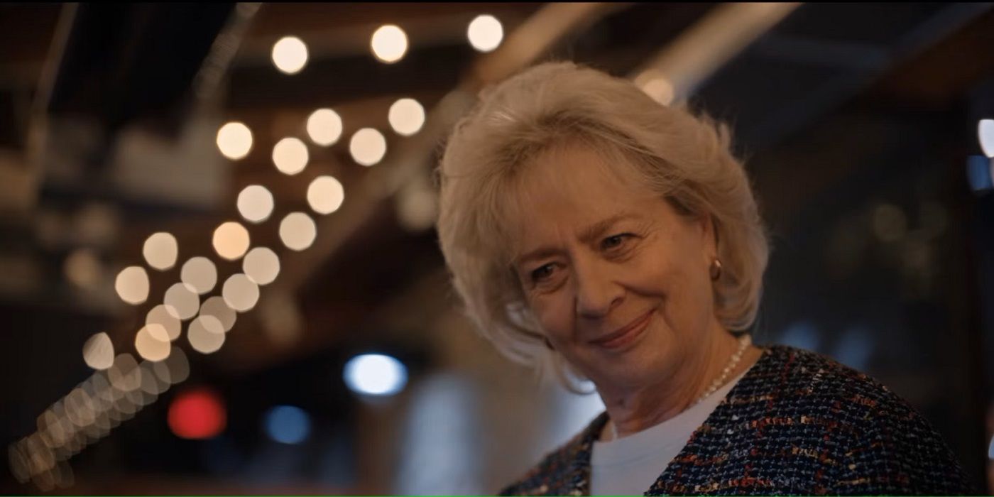 Melissa Montgomery looking down and smiling in Virgin River