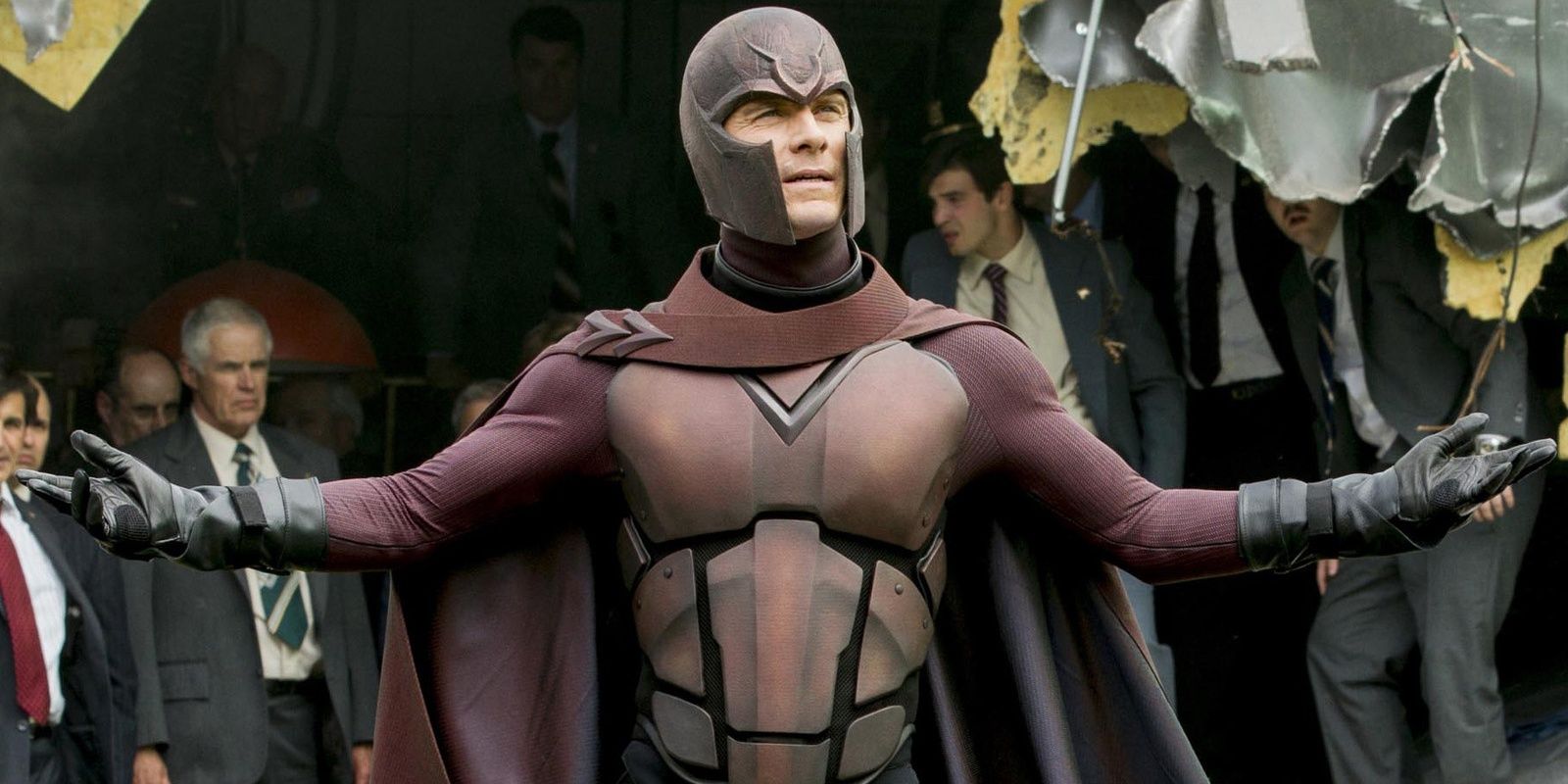Michael Fassbender As Magneto holding arms out in X-Men Days of Future Past
