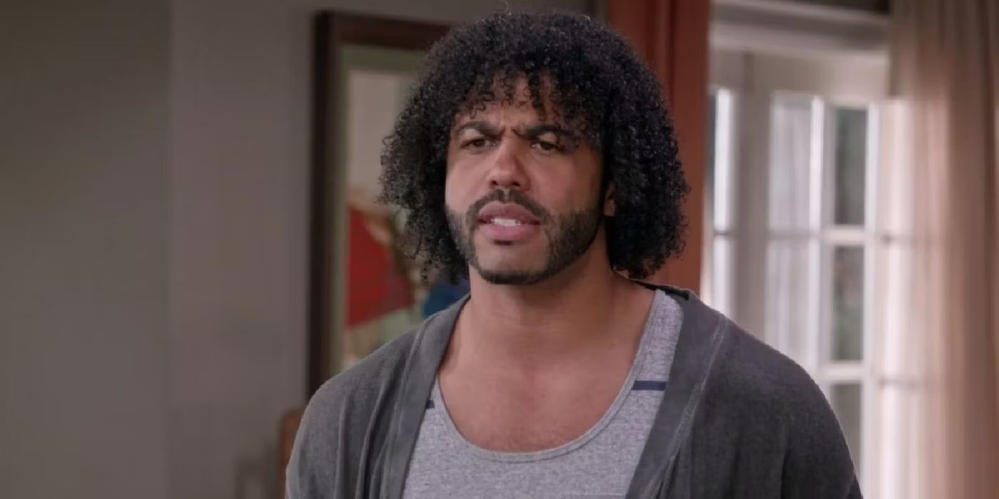Daveed Diggs in a bathrobe looking puzzled in black-ish