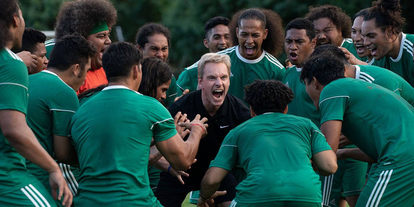 Michael Fassbender celebrating in Next Goal Wins