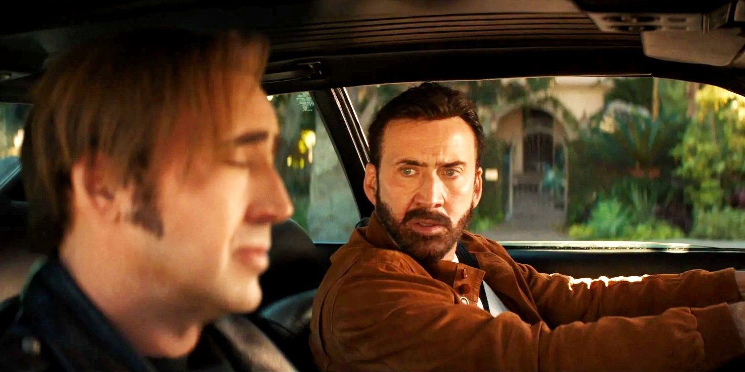 Nicolas Cage driving the car while looking at a younger version of himself in The Unbearable Weight of Massive Talents