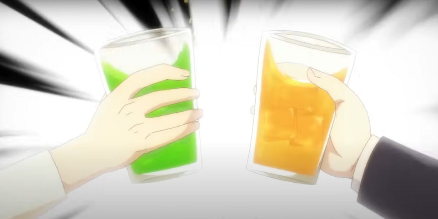 Ozawa and Kugisaki clinking their drinks in celebration.