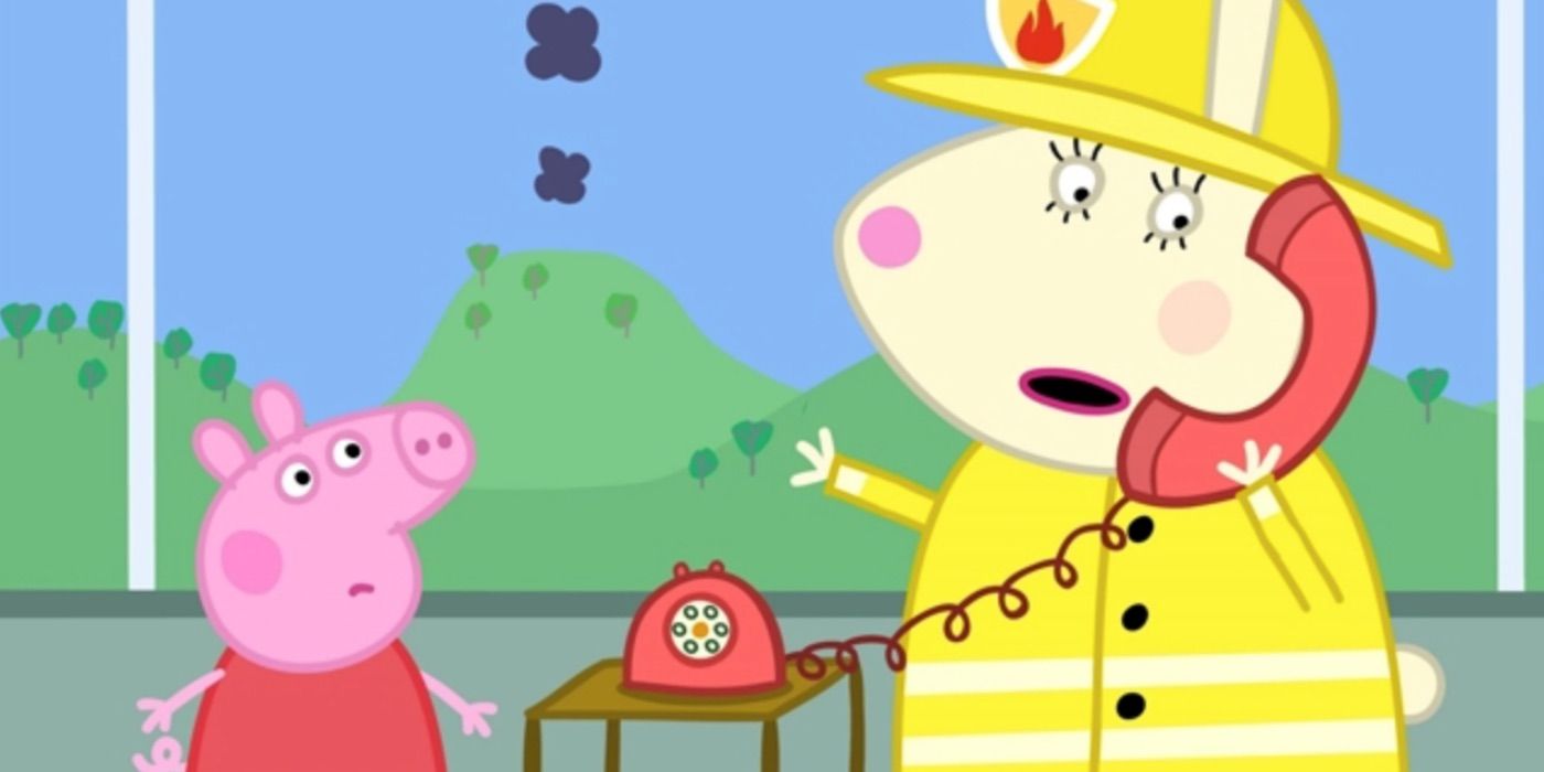 Miss Rabbit answers the phone while dressed in her firefighting gear in Peppa Pig