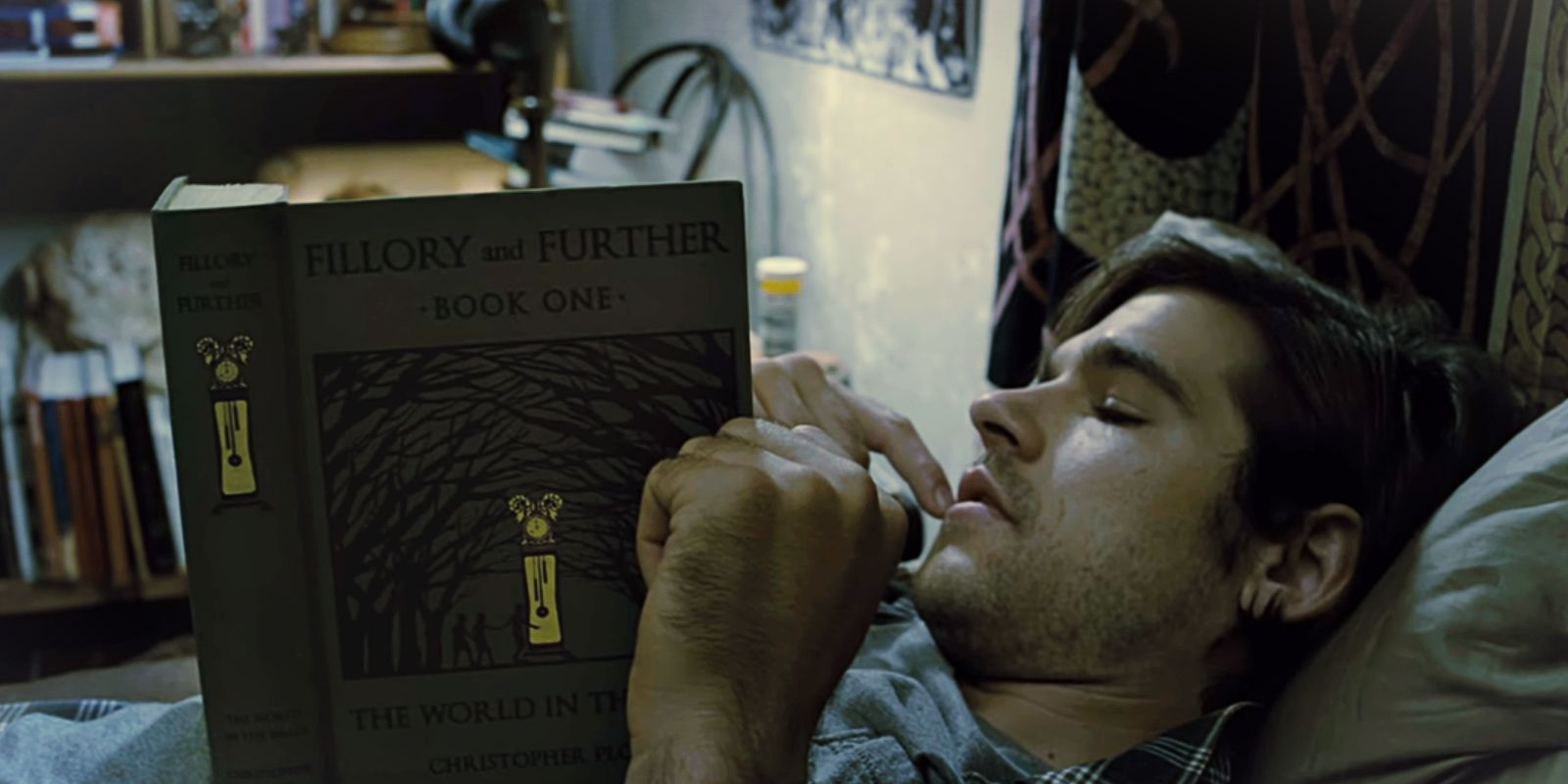 Quentin lays in bed reading the Fillory and Further books.