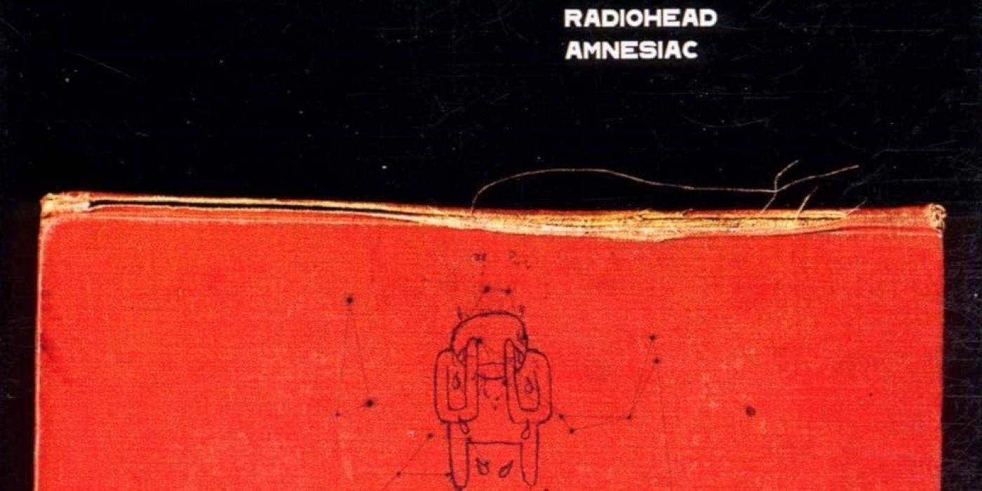 Radiohead Amnesiac album cover of a red book with a robot hiding his eyes. (2)