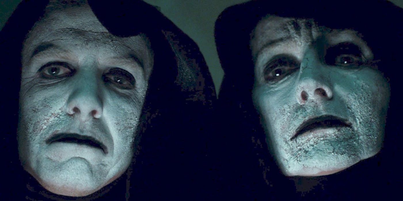 Two figures with painted white faces look down in Regression