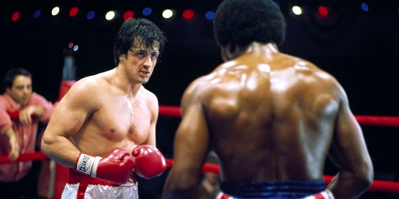 Rocky Balboa (Sylvester Stallone) faces off against Apollo Creed (Carl Weathers) in Rocky (1976).