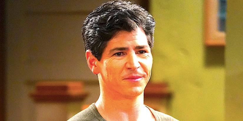Roseanne's DJ with a half smile in The Conners