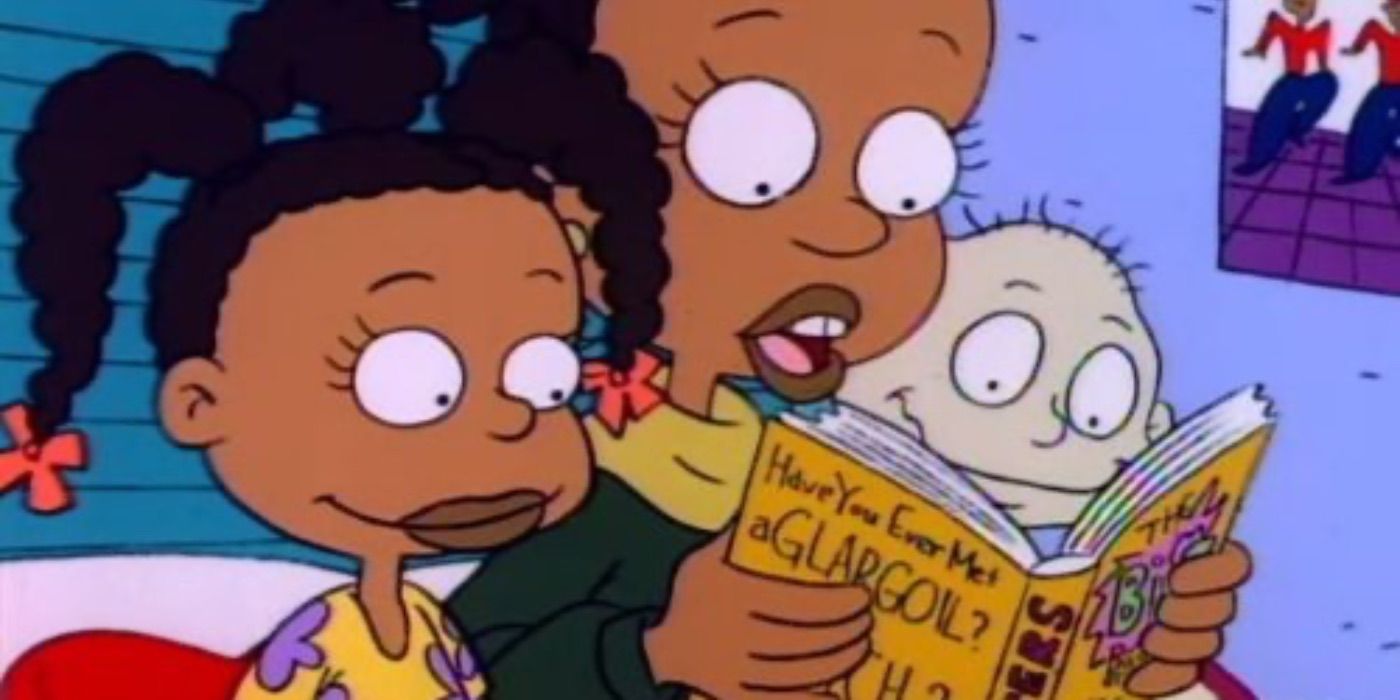 Tommy and Susie listen to a scary story from the Babysitter in Rugrats
