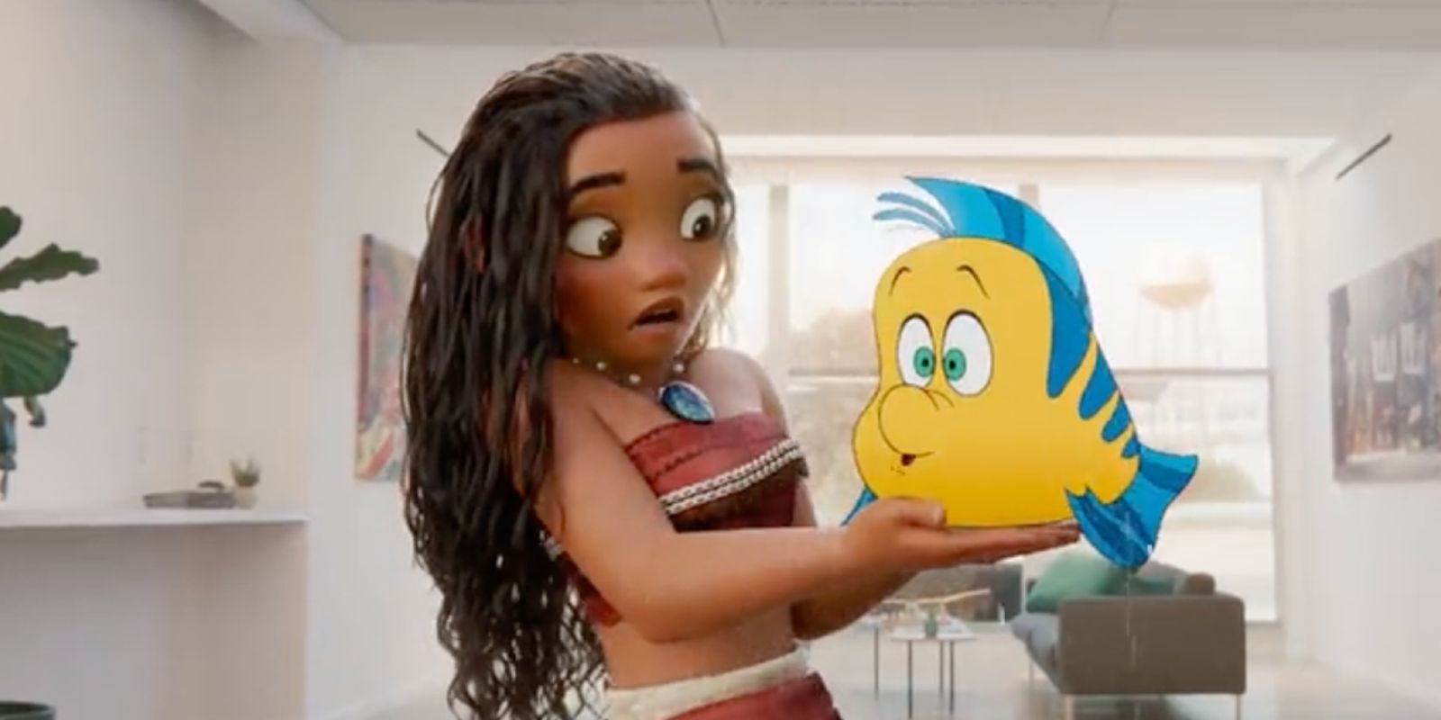 Moana holding 2D animated Flounder in Once Upon A Studio