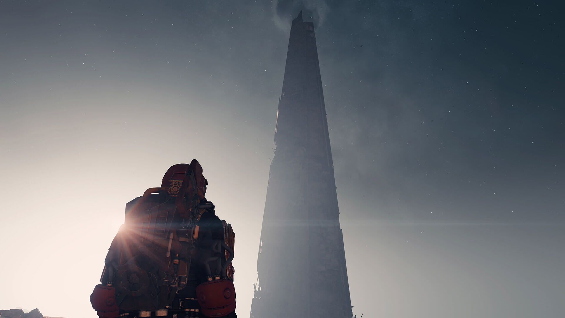 A character in a space suit stares up at the remains of the London Landmark, The Shard, in Starfield