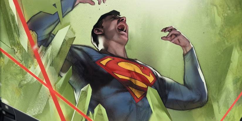 Comic book art: Superman cries out in pain, surrounded by green Kryptonite 