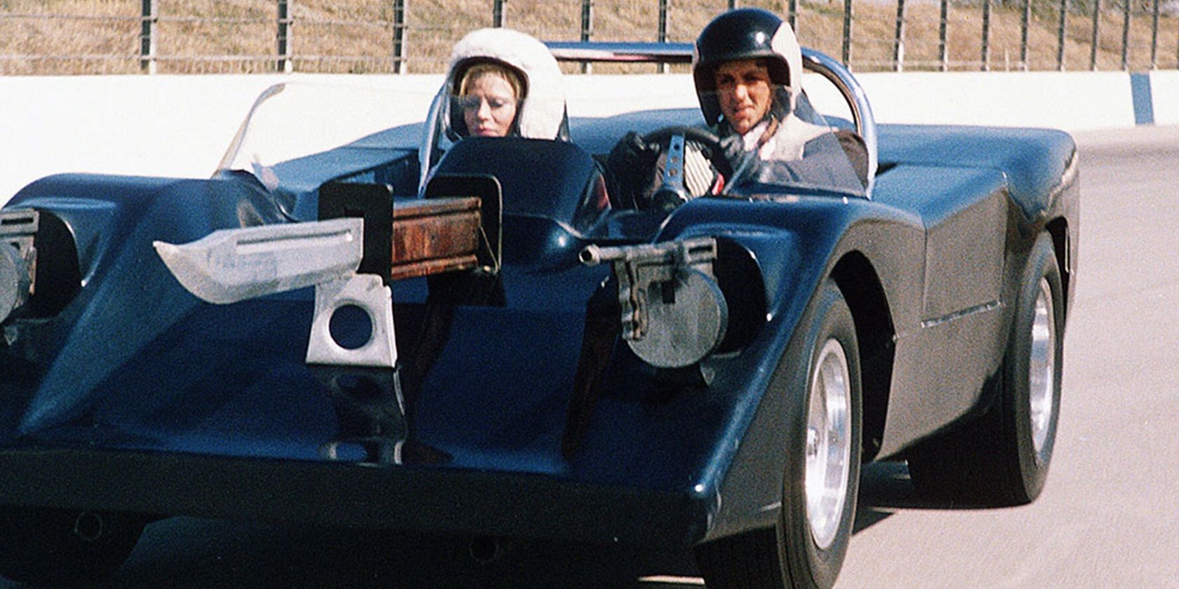 Sylvester Stallone driving a car in Death Race 2000
