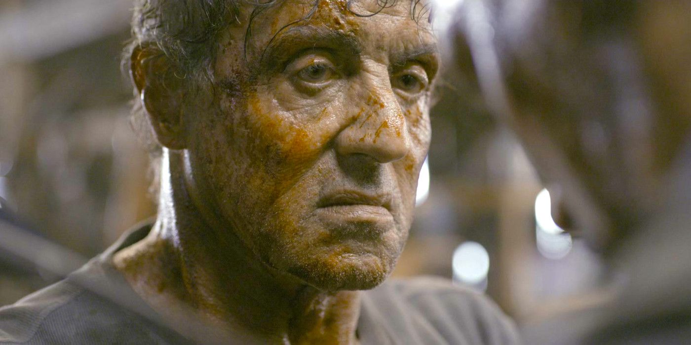 Sylvester Stallone blood spattered and scowling in Rambo: Last Blood