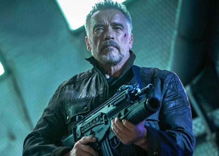 Carl (Arnold Schwarzenegger) with a gun in Terminator: Dark Fate