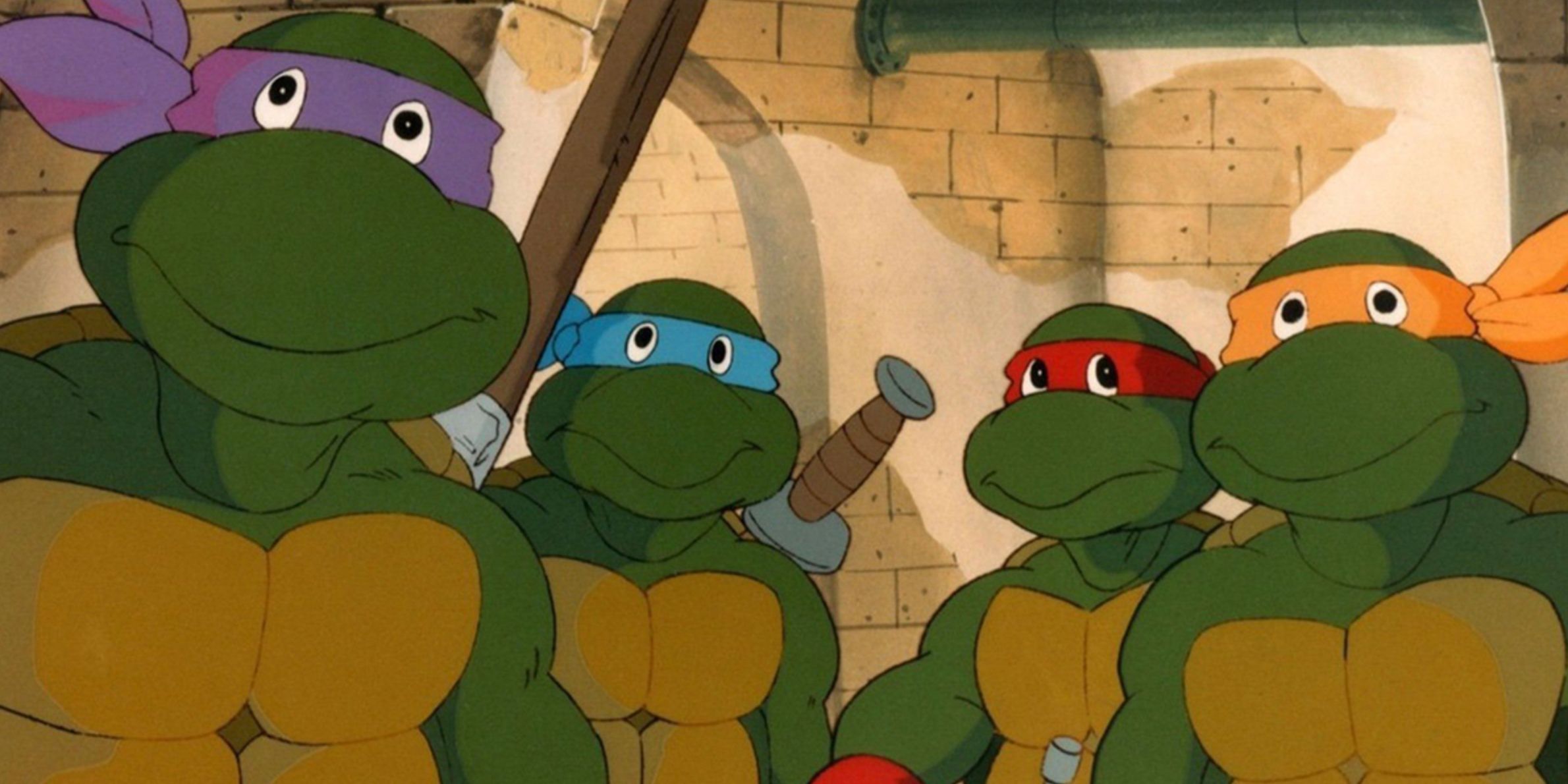 The 1987 animated Teenage Mutant Ninja Turtles standing in the sewer