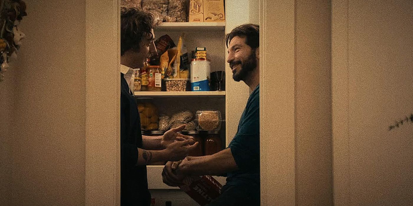 Carmy (Jeremy Allen White) and Mikey (Jon Bernthal) talk in a pantry closet in The Bear season 2, episode 6, 