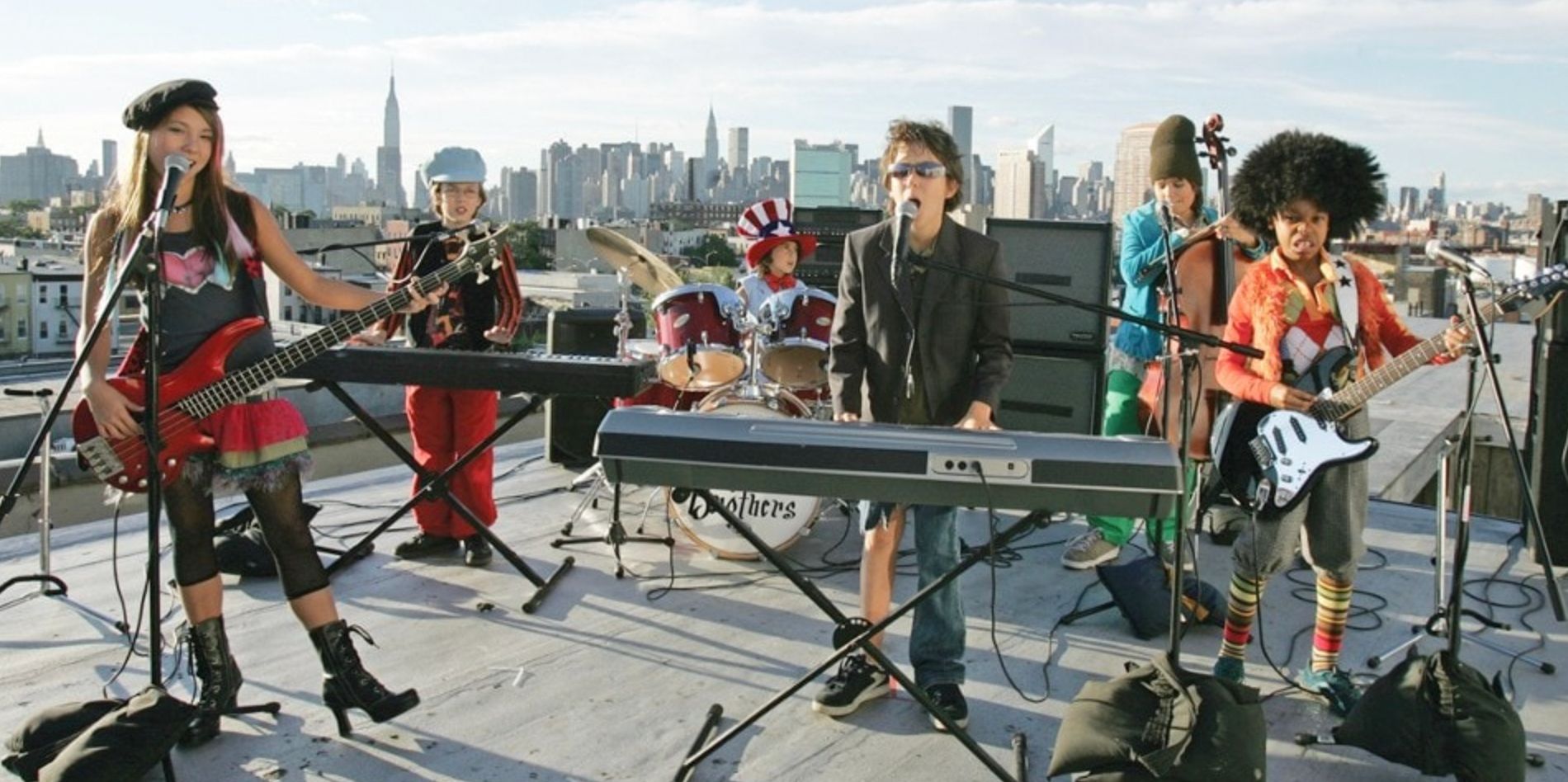 The Naked Brothers Band performs on a rooftop