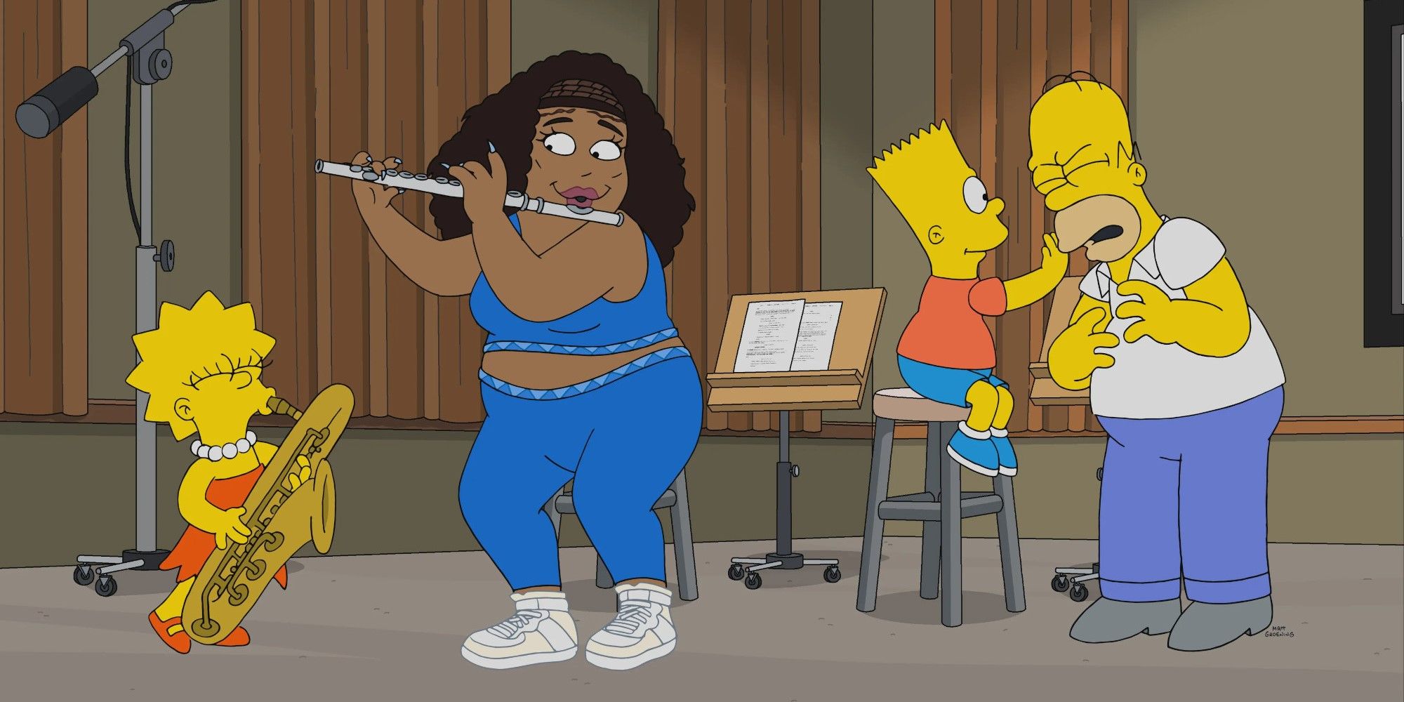 Lizzo playing the flute on The Simpsons while Lisa plays the trumpet and Bart and Homer talk in the background