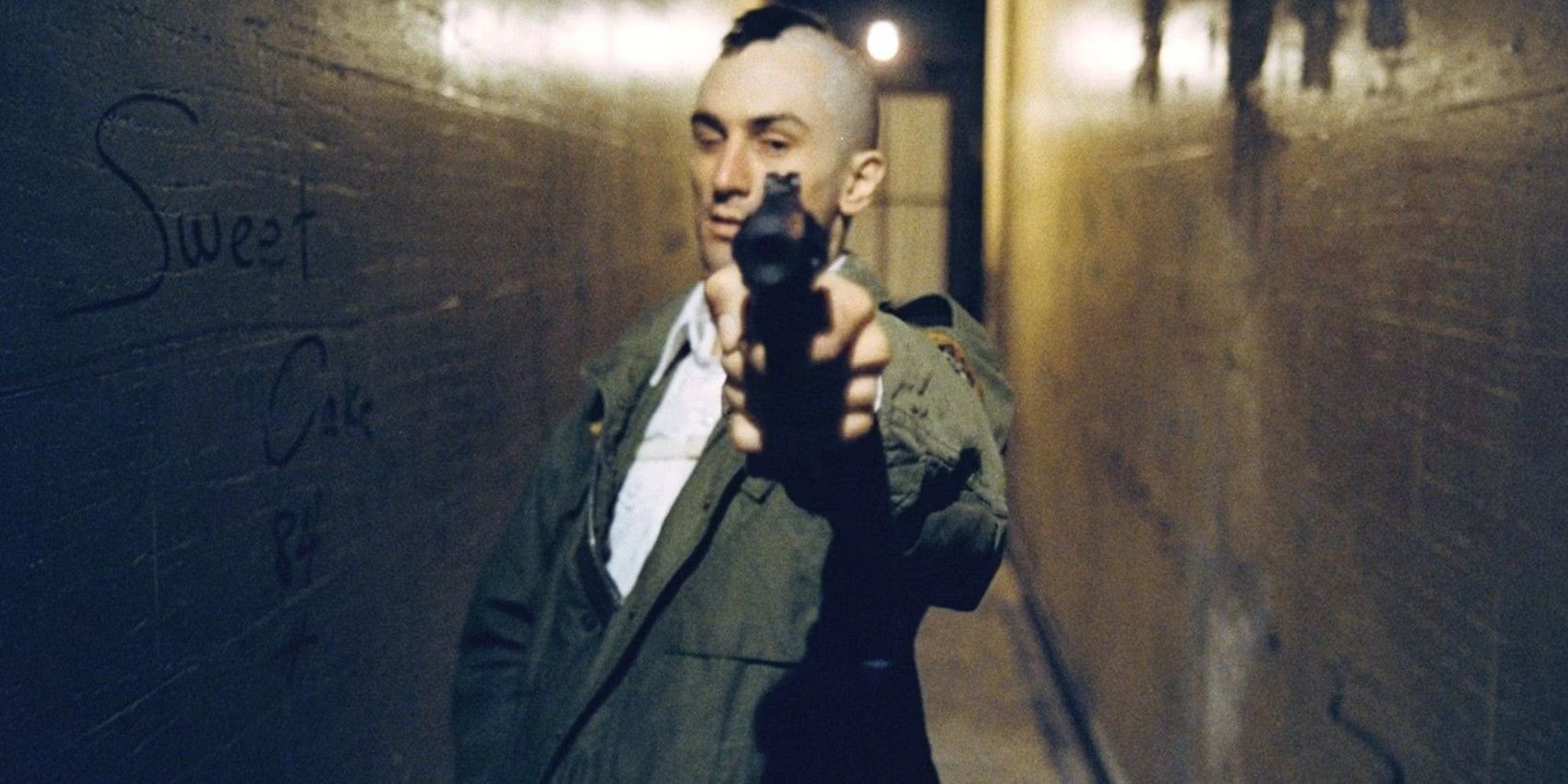 Travis with a gun in Taxi Driver