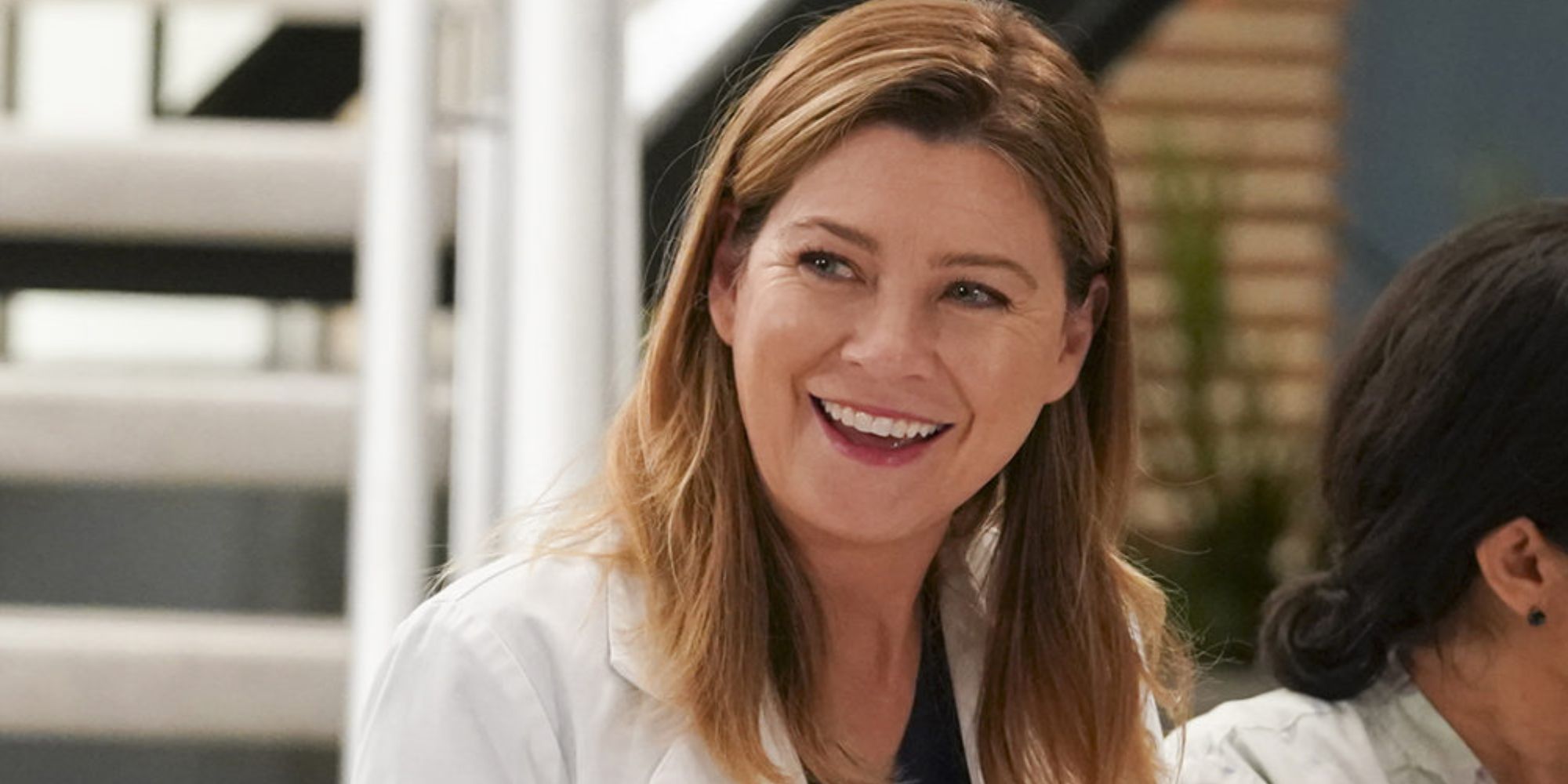 Meredith Grey smiles in Grey's Anatomy.