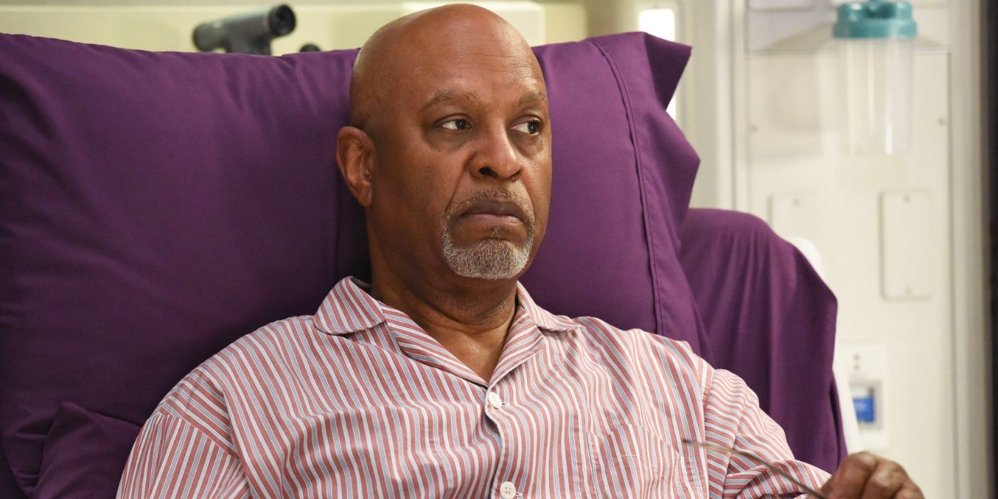 Richard Webber giving a stern look while sitting in a hospital bed with purple covered pillow in Grey's Anatomy